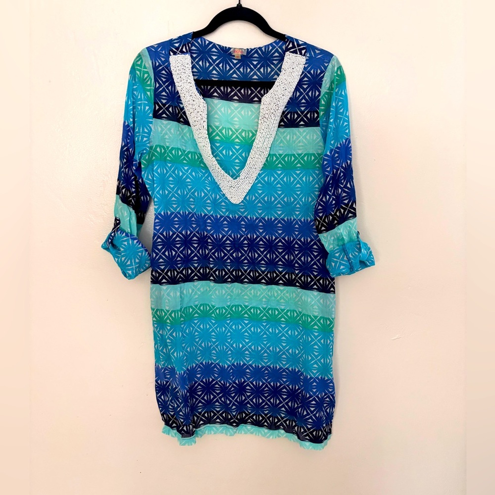 Echo beach cover up in blue tones with a beaded collar